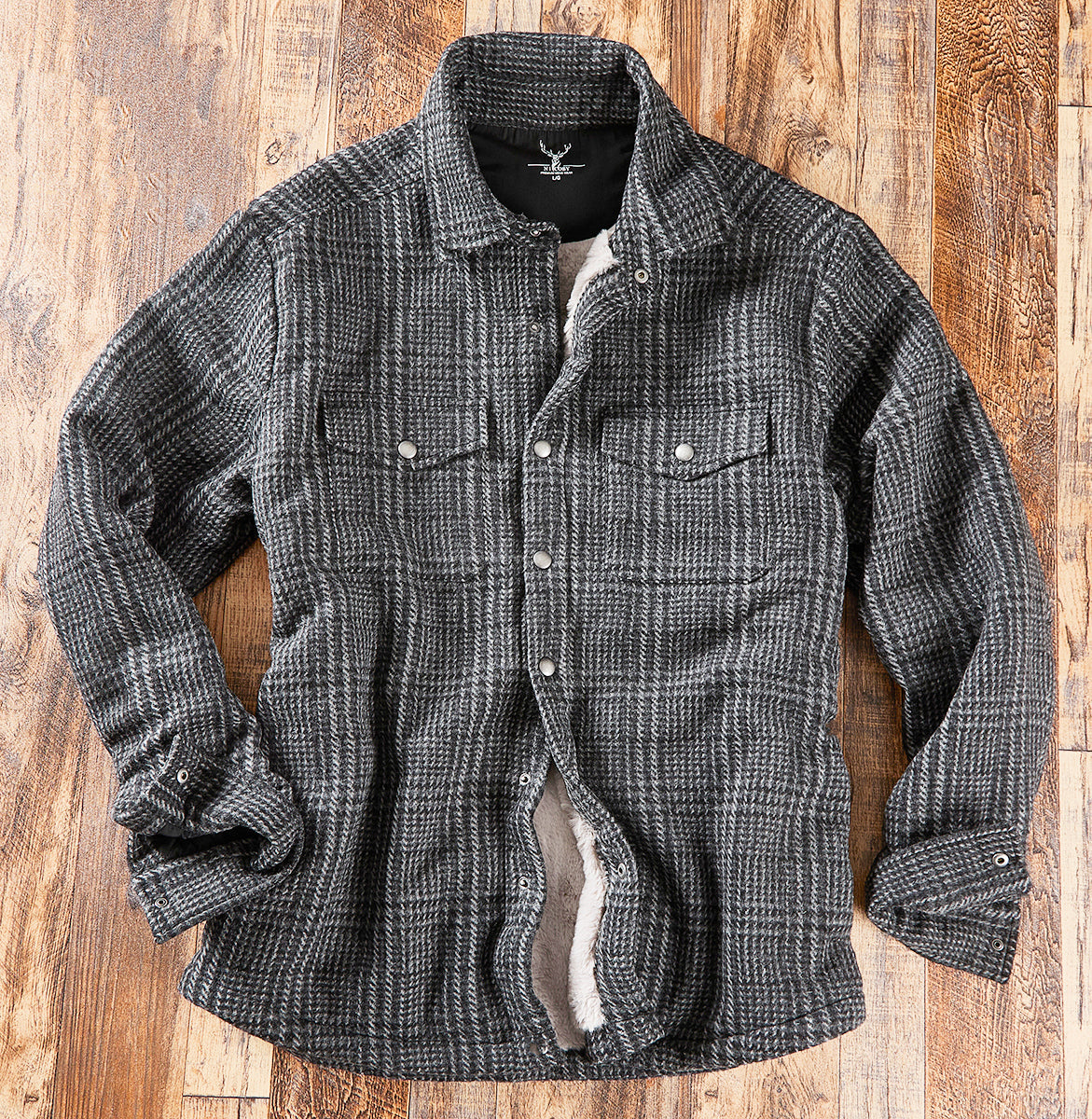 Shadow sherpa-lined flannel shirt jacket with its light faux-fur lining visible