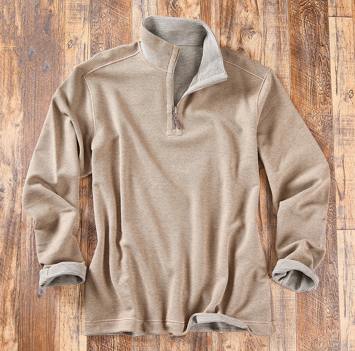 Tan waffle-knit quarter-zip with contrasting light gray collar and cuffs