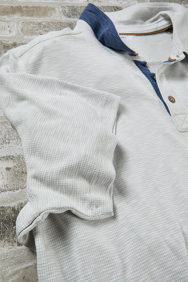 Close up of premium light gray polo shirt